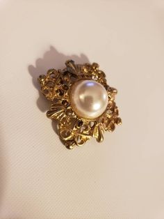 "This is a very nice gold tone Clip on Brooche. It measures 1 1/4\" square." Vintage Pearl Gold Brooches, Vintage Gold Pearl Brooches, Elegant Gold-tone Brooches For Formal Occasions, Elegant Gold-tone Brooches For Gifts, Gold Pearl Brooches For Wedding, Formal Gold Pearl Brooches, Vintage Gold-tone Brooches For Formal Occasions, Vintage Gold Brooches For Formal Occasions, Victorian Gold Brooches For Evening