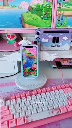 a cell phone sitting on top of a computer desk next to a keyboard and mouse