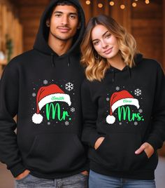 Personalized Christmas Couple Hoodie, Custom Mr. and Mrs. Hoodie, Customized Christmas Gift For New Married, Funny Couple Hoodie HOW TO ORDER 1-) Please, check and review all photos 2-) Choose your item size and color 3-) Click add to cart. You can go back to add more product 4-)Click "Proceed to check out" 5-)When you check out, you can add a note to seller for any request PRODUCT FEATURE It's a 50% Cotton /50% polyester, 13.5oz fleece. It features a double-needle collar, shoulders, and armholes. It also features double-needle cuffs, a banded bottom, set-in sleeves and a quarter-turned body and 1X1 Athletic rib with Lycra®. WASHING INSTRUCTIONS Wash inside out in cold water on a gentle cycle. Tumble dry on low heat or air dry Do not use fabric softener or bleach Do not dry clean Avoid iro Mrs Hoodie, Mr Und Mrs, Funny Couple, Couples Hoodies, Product Feature, Funny Couples, Christmas Couple, Mr And Mrs, Look Plus