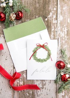 two christmas cards on top of each other with red ribbon and ornaments around the edges