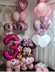 minnie mouse balloon decorations and balloons in the shape of numbers 3, 4, 5, 6