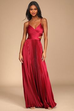 It will be clear just how glamorous you are in the Lulus Got the Glam Wine Red Pleated Cutout Maxi Dress! Sleek woven satin shapes this dress that has adjustable spaghetti straps, a surplice neckline, and a fitted bodice with padded cups. A back cutout peeks around to the sides atop a banded waist and an accordion-pleated maxi skirt. Exposed silver zipper on the top and hidden back zipper/clasp on the skirt. Fit: This garment fits true to size. Length: Floor length. Size medium measures 57.5" fr Red Dress For Bridesmaid, Red Velvet Formal Dress, Pleated Formal Dress, Satin Maxi Dresses, Formal Wedding Guest Dress Classy, Dresses For A Gala, Red Formal Dresses Long, Make Your Own Prom Dress, Pleated Dress Formal