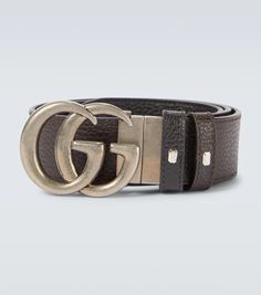 Crafted in Italy from leather, this black belt from Gucci features the label's double G buckle logo in antique silver, this style comes with punch holes for an adjustable fit. It is also reversible and comes in black and brown..Color of fastening: antique silver.Comes with dust bag.Reversible.Made in Italy.Material: calf leather.Width 3,5cm-1.5'.Buckle width 5cm-2' Black Leather Belt With Silver-tone Logo Plaque, Silver Leather Belt With Logo Plaque, Silver Leather Belt Buckle With Logo Plaque, Designer Silver Belt With Buckle Closure, Black Leather Belt Buckle With Metal Logo, Luxury Silver Belt With Buckle Closure, Classic Leather Belt With Silver-tone Logo Plaque, Designer Black Belt Buckle With Silver-tone Logo, Designer Black Belt Buckles With Silver-tone Logo