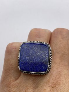 Large genuine aqua blue Lapis Lazuli Vintage ring Low content silver not sterling. Size 6 Can be re sized.  My jeweler charges $20 All rings are shipped in a nice gift box.   Check out our over a THOUSAND great reviews Engraving is $4 per letter and is not always perfect depending on the piece. It can take a few days if the jeweler is busy. This is payable to Paypal Judithsltd@gmail.com Adjustable Blue Stamped 925 Jewelry, Blue Sterling Silver Ring, Collectible Blue Sterling Silver Jewelry, Adjustable Blue Rings With Large Stone, Collectible Blue Gemstone Ring, Sapphire Ring Jewelry Gift, Nickel-free Silver Rectangular Rings, Unique Blue Nickel-free Rings, Classic Blue Jewelry Stamped 925