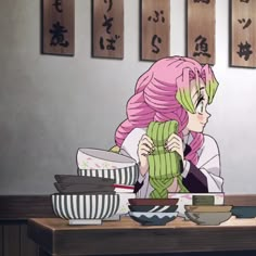 a woman with pink hair sitting at a table in front of bowls and plates on it