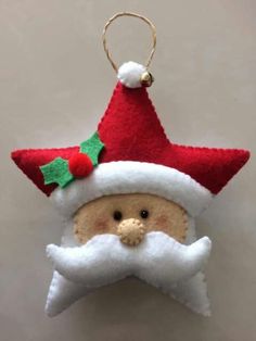 a christmas ornament hanging on a wall