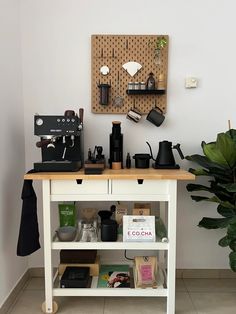 a coffee bar with various items on it