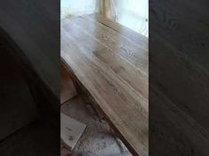 three different views of a wooden bench in front of a window