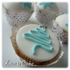 cupcakes decorated with frosting and blue icing