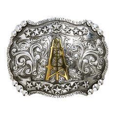 Product Details: Oil derrick with traditional western scrolls and stars design Antique gold and silver 3 1/4" H x 4 1/4" W Rectangle Fits belts up to 1 3/4" wide Zinc