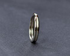 An infinite wave that has no beginning or end.The infinity ring is silversmithed by me in my home studio, creating a gorgeous, understated piece of sterling silver jewellery.The infinity ring comes with a bright finish, and is made from 100% recycled sterling silver! Buy eco! Handmade Minimalist Infinity Rings, Minimalist Handmade Infinity Rings, Metal Minimalist, Silver Infinity Ring, Cardboard Gift Boxes, Sterling Silver Jewelry Handmade, Infinity Ring, Sterling Silver Jewellery, The Infinity