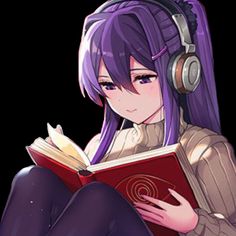 a girl with headphones is reading a book