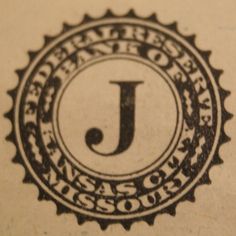 a stamp with the letter j on it