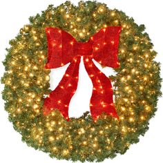 a christmas wreath with red bows and lights