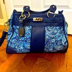 New Without Tags Simply Fabulous By Stacey Whitmore Blue Quilted Paisley Material With Navy Faux Leather Has Long Strap In Addition To Handles 2 Large Interior Pockets 3 Smaller Interior Pockets Blue Faux Leather Shoulder Bag, Blue Faux Leather Shoulder Bag For Everyday Use, Blue Faux Leather Bags For Daily Use, Blue Faux Leather Travel Bags, Blue Faux Leather Bag For Daily Use, Blue Rectangular Faux Leather Bag, Trendy Blue Faux Leather Bag, Trendy Blue Shoulder Bag With Snap Closure, Chic Blue Bag With Snap Closure