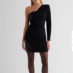 An Elevated Party Dress With A Strong Shoulder, Flirty One Shoulder Neckline, And A Shiny Sequin Detail. Style With Your Favorite Heels And Make A Statement When You Walk Into The Room. Dressy Sheath Bodycon Dress For Party, Dressy Sheath Mini Dress For Party, Glamorous Evening Bodycon Sheath Dress, Chic Sheath Bodycon Dress For Party, Sheath Bodycon Dresses For Party, Bodycon Sheath Party Dress, Fall One-shoulder Bodycon Dress For Party, One-shoulder Bodycon Dress For Dinner, Dressy Sheath Bodycon Evening Dress