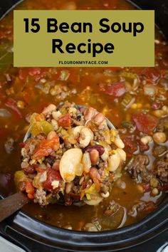 a spoon full of bean soup in a crock pot with text overlay that reads 15 bean soup recipe