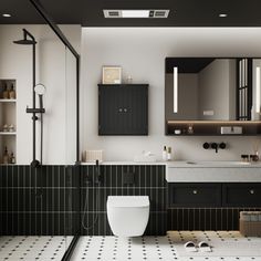 a modern bathroom with black and white tiles on the floor, toilet, sink and shower