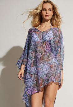 Our Kiki Short Mesh Kaftan will be on repeat all summer long. We're naming it the new summer go-to with wrinkle resistant fabric, and a flirtatious deep v neckline. Plus we can't get enough of the statement-making Monarch print. Somedays we're wearing it over a swimsuit as a coverup and the next we're layering it with a Caterina Short Stretch Knit Dress. Go ahead and stand out from the crowd. We see this kaftan, a new romance novel, and airplane mode in your future. Mesh Fabric One size fits all New Romance, Nyc Model, Stretch Knit Dress, Airplane Mode, Bias Binding, White Short Dress, Butterfly Wing, French Seam, On Repeat