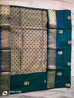 Product Details : Saree Type : Hand weaving katan silk saree with blouse piece,sornogolap saree,colour green and all over golden jari work ,Indian saree,Bengali traditional and ethnic wear,women formal wear ,ethnic saree. Blouse Piece : Yes (Un-Stitched) Saree Length : 6.5 Meters Blouse Piece Length : 80 cm Saree Weight : 0.7 kg Saree Fabric : Katan silk  Color : As shown in the picture Work : weaving Pattern : designer Occasion: Formal Wear, Festival Wear , Marriage Function Wear, Casual Wear, Green Handloom Paithani Silk Blouse Piece, Green Saree With Motifs For Festivals, Green Pre-draped Saree With Motifs, Green Katan Silk Lehenga With Zari Weaving, Green Pre-draped Saree With Motifs In Art Silk, Green Paithani Silk Saree For Festivals, Festival Green Paithani Silk Saree, Green Pre-draped Saree With Motifs For Diwali, Green Katan Silk Blouse Piece With Pallu