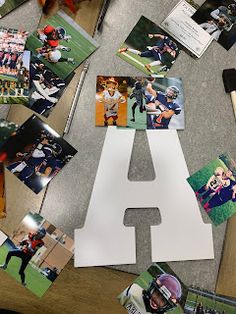 a table topped with pictures and photos of baseball players