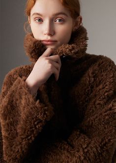 Wrap yourself in luxury with our Larissa Coffee Wool Fur Teddy Coat. Crafted with premium sheepskin and plush wool, this coat will keep you warm and stylish all winter long. The added thickness ensures maximum coziness, making this the perfect choice for the fashion-conscious woman. 100% wool sheep fur Oversize fit Collared Single-breasted button closure Two side pockets Drop shoulders Dry clean Item #132282 Women's winter wool coat/jacket SIZE INFO XS=US2=UK6=EU32 S=US4-6=UK8-10=EU34-36 M=US8-1 Brown Lambswool Outerwear For Fall, Luxury Fluffy Outerwear For Fall, Luxury Fluffy Long Sleeve Outerwear, Luxury Wool Fur Coat For Cold Weather, Brown Cozy Fur Coat With Faux Fur Lining, Luxury Long Sleeve Fluffy Outerwear, Cozy Brown Fur Coat With Faux Fur Lining, Brown Lambswool Long Sleeve Outerwear, Luxury Wool Fur Coat For Women