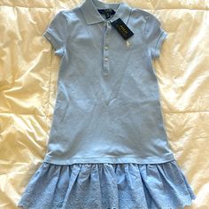 Girls Adorable Light Blue Rl Polo Dress. Eyelet Ruffle Bottom, Collar And Bottom Front. Size 7 Never Worn With Tags Cute Fitted Ralph Lauren Dress, Cute Ruffled Ralph Lauren Dresses, Cute Ralph Lauren Short Sleeve Dress, Cute Ralph Lauren Dress With Ruffles, Fitted Cotton Ralph Lauren Dress, Fitted Cotton Dress By Ralph Lauren, Fitted Ralph Lauren Cotton Dress, Casual Blue Ralph Lauren Dress, Casual Ralph Lauren Dresses With Ruffles