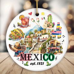 a mexican themed ceramic ornament hanging on a wooden table