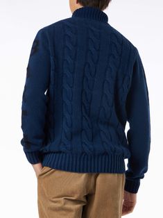 Man turtleneck braided blue sweaterFrosted dyed treatmentHeavyweightRegular fitSaint Barth jacquard print on the sleevesTrue to sizeRibbed collar bottom and cuffsComposition: 80% Wool 20% Polyamide Casual Blue Turtleneck Outerwear, Navy Cable Knit Sweater For Winter, Navy Cable Knit Sweater For Fall, Blue Jacquard Knit Outerwear For Winter, Man Turtleneck, Turtle Neck Men, Boho Swimwear, Cable Knit Turtleneck Sweater, Saint Barth