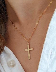 14k Gold-filled sparkle chain cross necklace!  This necklace is intricate and delicate necklace is perfect given as. baptism gift.  This necklace brings elegance to every outfit!  This necklace, like all our chain products comes with an extender chain. 🤍14k Gold filled chains and findings 🤍All Gold Filled Findings, so items will not tarnish✨ 🤍Come packaged and ready to gift.  🤍 Hypoallergenic jewelry that will last!    ⚜️ Gold filled products differ from gold plated.  Here are the major differences. Gold Filled: ✔️Affordable cost and great quality  ✔️Great for everyday wear ✔️Leave it on even when showering, water resistant! ✔️Tarnish resistant  ✔️Hypoallergenic  ✔️Gold layer is thicker than gold plated and bonded to base metal rather than painted on! Gold Plated ‼️OUR JEWELRY IS NOT G Gold Cross Necklace With Delicate Chain As Gift, 14k Gold Filled Cross Necklace Gift, 14k Gold Filled Cross Pendant Necklace As Gift, Gold Crucifix Necklace For Wedding, Gold Dainty Cross Pendant Charms, Gold Delicate Chain Cross Necklace, Delicate Gold Cross Pendant Necklace, Delicate Gold Cross Necklace With Delicate Chain, Gold Cross Pendant Necklace For First Communion