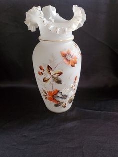 This beautiful antique Victorian Bristol vase is a stunning piece of glassware that will add elegance to any room. (TV1) Handmade with intricate floral patterns, this large vase stands 15 and 1/8" tall and is 4 and 3/8" wide at the top. Its multicolored finish and hand-blown glassmaking technique make it a unique and valuable addition to any collection. Perfect for all occasions and any room, this vase requires no additional parts and comes unboxed. Its original and unknown age adds to its charm and appeal. Don't miss out on the opportunity to own this original piece of decorative collectible. This is preowned and in good shape. Please see pictures for greater details. Please check out other items in  our store. Thank you! Victorian Vases, Vase Antique, Tall Vase, Tall Vases, Floral White, Large Vase, Antique Victorian, Floral Painting, White Glass