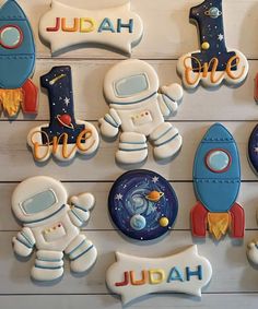 cookies decorated to look like astronauts and rockets