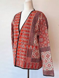 This jacket is part of our new specialty collection which redefines handcrafted artisan fashion. Traditional box cut with 2 front pockets. This pattern is kantha hand printed, incredible detailing. Designer finishes and piping in black. Long sleeves may be rolled or folded based on your desire. Jacket is to be worn open. Stunning blend of colors. Incredible value from a recognized artisan. This jacket is the traditional kimono cut and considered a classic that will be worn and appreciated for years to come. Made with the highest caliber of materials and exhibits several different types of embroidery. Unique and one of a kind. This jacket can be worn over a long silk tank dress, palazzo pants, slacks, skirt and even jeans. It Is perfect for any event and great for travel. The embroidery pat Different Types Of Embroidery, Embroidery Unique, Silk Tank Dress, Fashion Traditional, Artisan Fashion, Traditional Kimono, Types Of Embroidery, Embroidered Shorts, Silk Tank