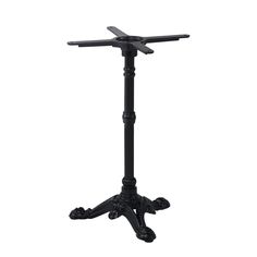 a black metal table with two legs and a cross on it's end stand