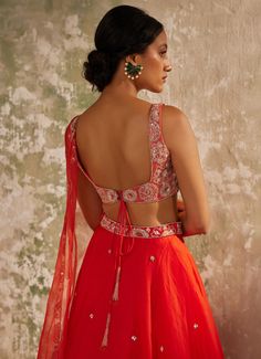 Unveil your inner elegance with the exquisite Red Embroidered Silk Organza Lehenga Set, a perfect blend of tradition and modernity. Crafted from pure silk organza, this ensemble features a red lehenga that exudes opulence through its all-over handwork motifs, adding a touch of luxury to every twirl. Paired with a delicately embroidered blouse, meticulously crafted with intricate aari handwork that showcases timeless artistry, the look is completed with a dupatta adorned with a heavily hand-embroidered border and motifs, elevating the ensemble to a new level of elegance. Perfect for a bride or bride-to-be on your special day, this outfit promises to make you the center of attention with its vibrant hue and breathtaking design. Composition : Dupatta & Lehenga - Pure Silk Organza, Blouse - Me Handwork Motifs, Indian Closet, Organza Lehenga, Organza Blouse, Design Composition, Outfits Woman, Big Fat Indian Wedding, Red Lehenga, Indian Wedding Wear