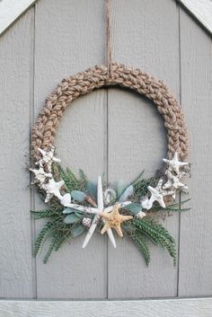 a wreath made out of rope and seashells