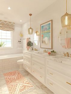 a bathroom with two sinks, a bathtub and a rug in front of it