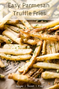 french fries with herbs and seasoning on top