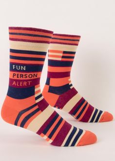 Funny socks for men feature a striped design in coral, navy, magenta, and taupe with the words, Fun Person Alert. Blue Q Socks, Humanitarian Work, Knitting Notions, Blue Q, Mens Crew Socks, Fabric Yarn, Men's Shoe, Men's Socks, Funny Socks