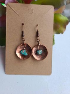 These earrings are made with hammered pennies and small turquoise colored chip style beads. They are beautiful and unique and will both complement any outfit and garner lots of compliments!French style copper hooks come with stopper style backs to keep them secure in your ears. Penny Jewelry Ideas, Hammered Metal Jewelry, Copper Jewelry Diy, Penny Jewelry, Copper And Turquoise, Hammered Copper Earrings, Pebble Jewelry, Copper Crafts, Hammered Jewelry