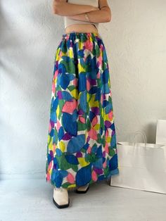 "- Vintage 1970s handmade rainbow skirt - Feathery material - Elastic at the waist - XS Waist: 22\" - 27\" Length: 41\"" Multicolor High Waist Maxi Skirt, High Waist Multicolor Maxi Skirt, Multicolor High Waist Skirt For Beach, Bohemian High Waist Multicolor Skirt, Bohemian High-waist Multicolor Skirt, High Waist Multicolor Beach Skirt, High Waist Multicolor Skirt For Beach, Multicolor High Waist Lined Skirt, High Waist Multicolor Lined Skirt