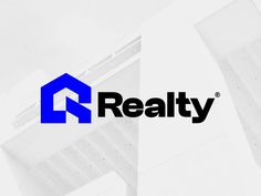 the logo for realty is shown in front of two tall buildings with blue letters on them