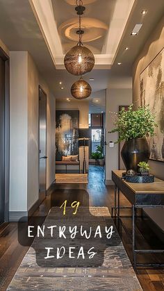 an entry way with wooden floors and large vases filled with plants on each side