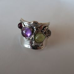 Multicolor Natural Stone Rings For Anniversary, Anniversary Rings With Multicolor Natural Stones, Silver Wide-band Jewelry With Gemstones, Silver Wide Band Jewelry With Gemstone, Silver Open Ring With Gemstone Accents, Unique Silver Multi-stone Gemstones, Multicolor Amethyst Ring For Gift, Silver Multi-stone Ring Gemstones, Fusion Style Multi-stone Open Ring Jewelry