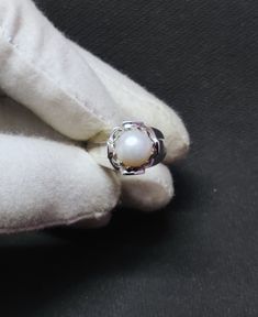 925 Silver Pearl Ring Men 9 mm Round Pearl Band Mens Pearl Ring Synthetic Pearl Ring For Men Heavy Silver Pearl Ring Gemstone : Pearl stone size : 9 mm Round Stone Carat : 5 Ct Metal : 925 Sterling Silver Setting : Prong Ring Size : US 6 - US 14 Weight : 8.5-9.5 gm ✱How to wear it...? You can wear it occasionally or daily also make sure to remove it during bathing or washing so that it look as new always. ✱Shipping : We will ship it via DHL E-commerce that will take around 2-3 weeks max. ✱Custom Pearl Rings For Men In Gold, Pearl Ring Men, White Gold Pearl Ring Stamped 925, White Signet Ring Stamped 925, Pearl Ring Designs Silver Men, Silver Pearl Ring With Gemstone In Round Cut, Silver Pearl Ring With Round Cut Gemstone, Silver Hallmarked Round Cut Pearl Ring, Formal Silver Pearl Ring Hallmarked