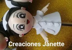 a cake that is decorated to look like a bride and groom with the words creaciones janette on it