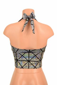 "This item is made to order, please read all the way through the listing before purchasing! This adorable silver on black cracked tile halter top ties behind the neck and back for a perfect fit! Darted cups, a wide band below the bust, and a gorgeous rainbow sheen! Extra Small: Bust 31\"-32\" / Waist 24\"-25\" / Hips 33\"-35\" Small: Bust 33\"-34\" / Waist 26\"-28\" / Hips 36\"-37\" Medium: Bust 35\"-37\" /Waist 28\"-31\" / Hips 38\"-40\" Large: Bust 39\"-41\" / Waist 32\"-34\"/ Hips 41\"-43\" E Party Stretch Crop Top With Tie Back, Stretch Crop Top With Tie Back For Party, Party Stretch Halter Top With T-back, Stretch T-back Halter Top For Party, Fitted T-back Halter Top For Festival, Silver Fitted Sleeveless Halter Top, Adjustable Halter Top For Summer Party, Fitted Silver Halter Top For Night Out, Metallic Fitted Sleeveless Halter Top