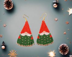 Christmas beaded fringe earrings are made of seed beads, silver plated ear hooks, nylon thread, silicon plugs. All the color fit perfectly the Christmas celebration and give a mesmerizing look that fits every outfit! Fringe earrings size: The full length of earrings with hook is 2.75inches approximately, the length beaded earrings is 2.5 inches. Please contact me if you want these earrings in another size. - Thank you for visiting MannatDesignCo!  - Please follow my Esty Page - Follow me on Inst Christmas Beading, Holiday Beading, Beaded Fringe Earrings, Native American Beaded Earrings, Christmas Bead, Beaded Earrings Patterns, Christmas Celebration, Earrings Christmas, Native American Beading