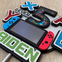 Gamer Cake Topper, Gamer Birthday Party, Gaming Cake Topper Birthday, Gamer Controller, Gamer Birthday Decorations, Video Game Cake Topper, Boy Birthday Party, Boy Party Decor, Boy Birthday Ideas #gamerparty #videogamesparty #gamercaketopper #gaming #videogames #controller #boybirthdayparties #boybirthdayparty #boybirthdaycake #themeparties #videogamecake #caketopper #gamer #switchcontroller #nintendoswitchgames #nintendoswitch #nintendoparty #partydecor #partythemes #partycake Nintendo Switch Cake Topper, Nintendo Switch Cakes For Boys, Nintendo Switch Cake Ideas, Nintendo Switch Birthday Party Ideas, Switch Birthday Party, 9th Birthday Boy Ideas, Nintendo Switch Birthday, Gamer Birthday Party Ideas, Gaming Cake Topper