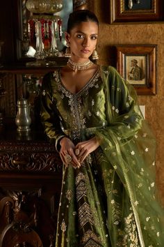 Green velvet anarkali with thread, zari and sequin embroidery. Paired with an embroidered santoon pant and net dupatta. - Aza Fashions Backless Anarkali, Silk Anarkali Gown, Churidar Sleeves, Tissue Dupatta, Velvet Anarkali, Anarkali Designs, Velvet Kurta, Green Anarkali, Silk Anarkali